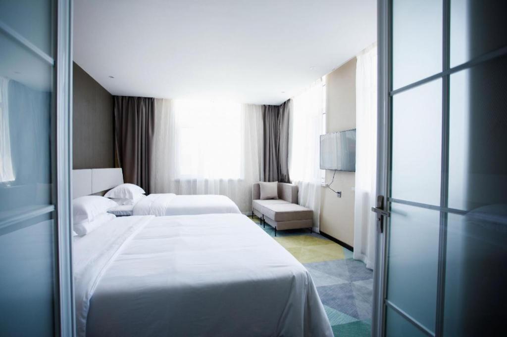 Iu Hotels- Xincheng Haibing University Store Huludao Exterior foto