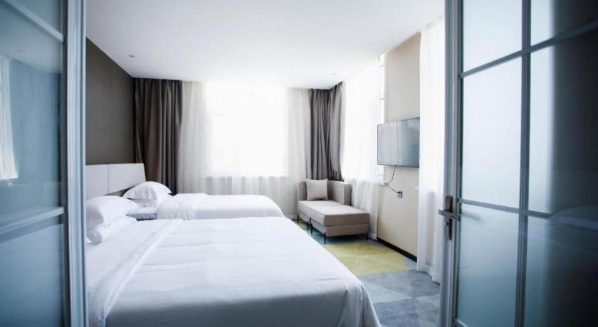 Iu Hotels- Xincheng Haibing University Store Huludao Exterior foto
